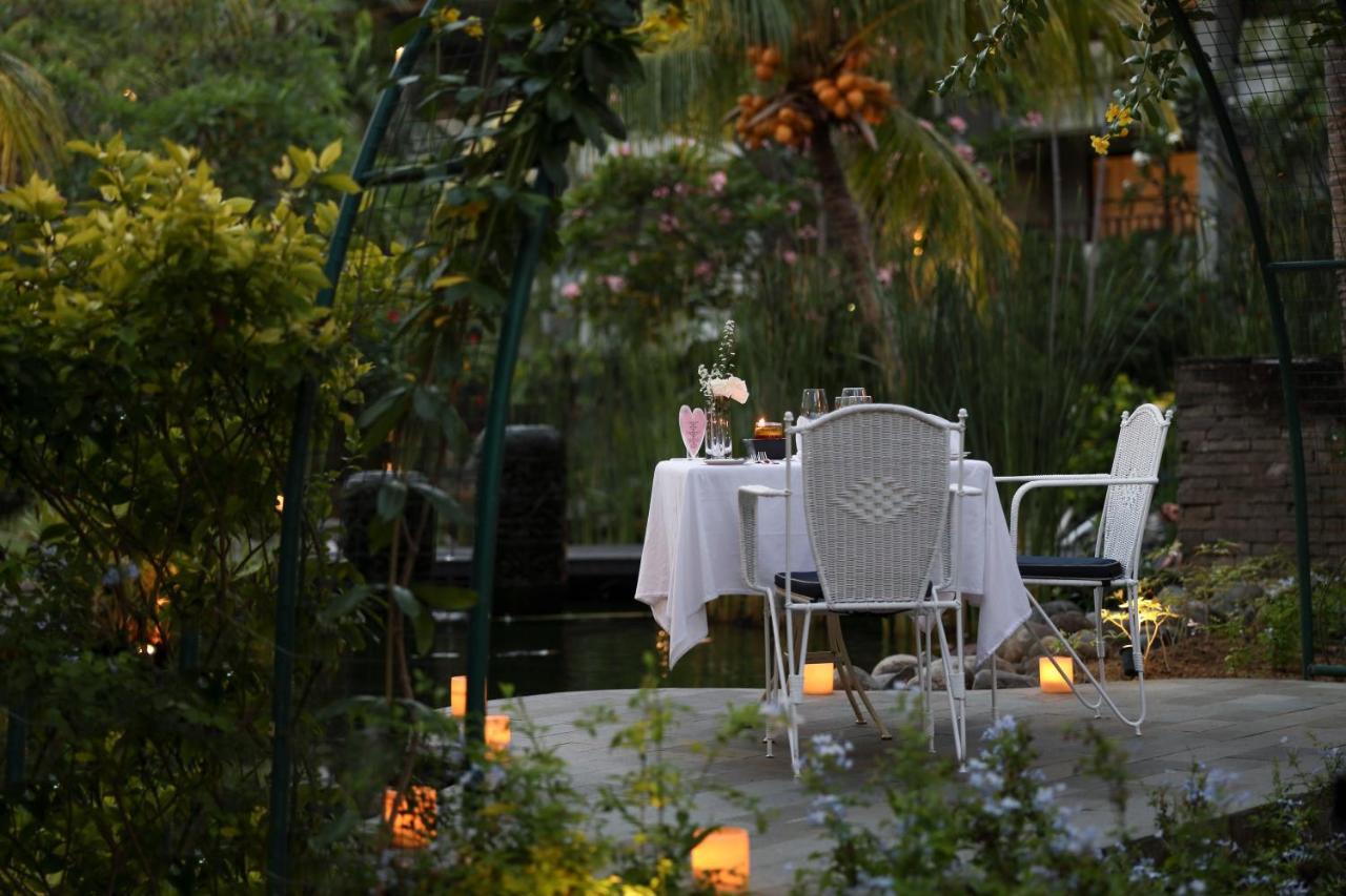 Bali Dynasty Resort กูตา ภายนอก รูปภาพ The garden at the hotel