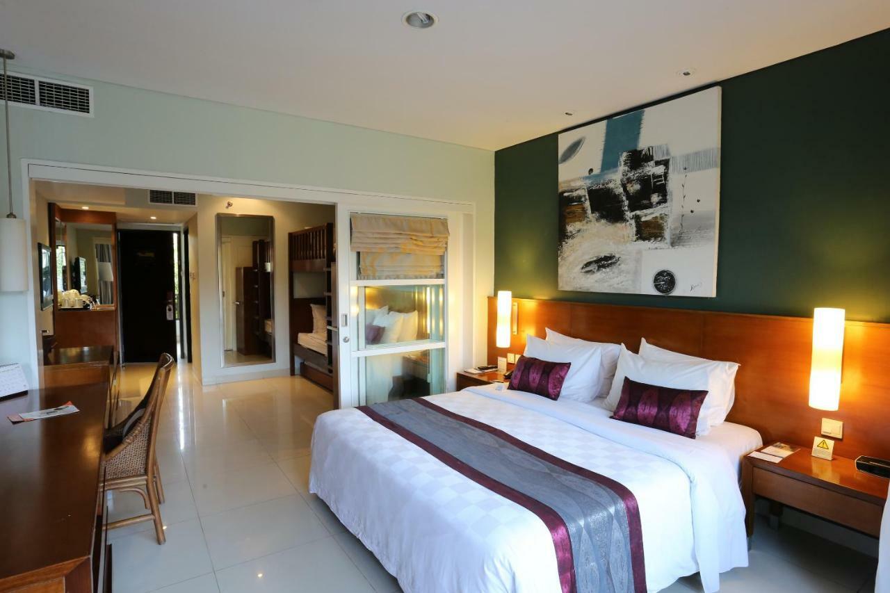 Bali Dynasty Resort กูตา ภายนอก รูปภาพ A bedroom at the hotel